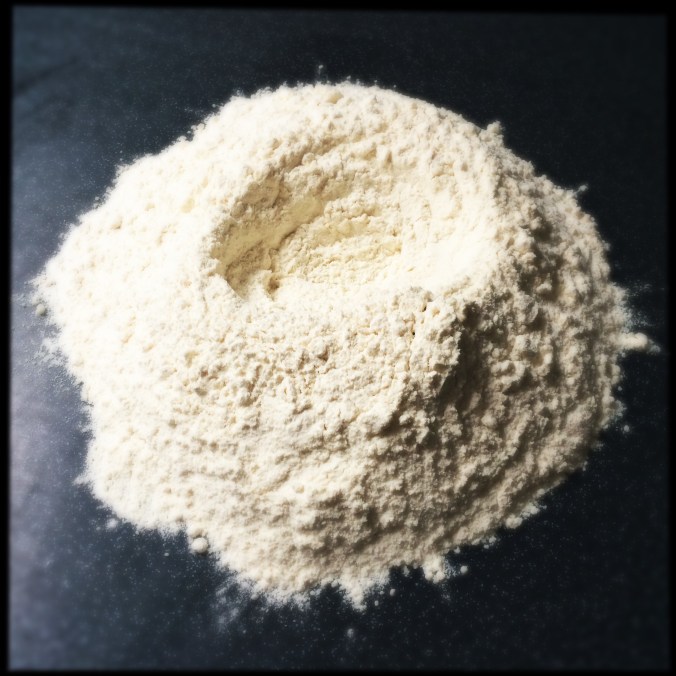 Making a well in the flour