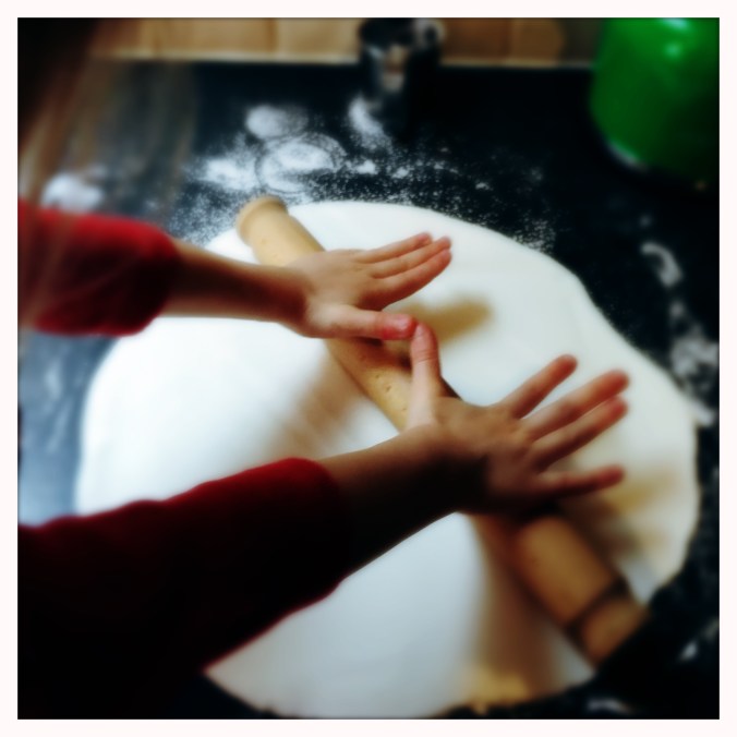 rolling out the icing for the Christmas cake