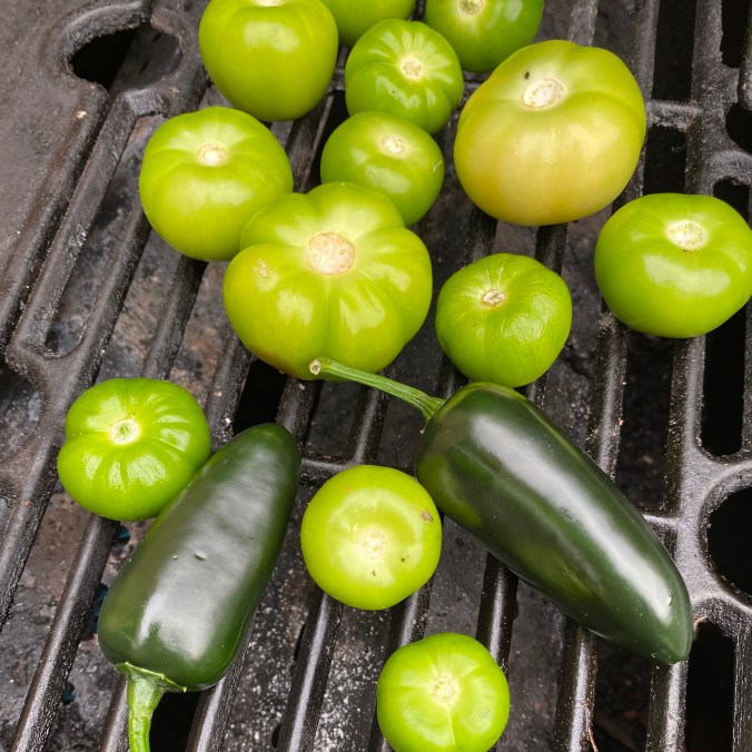blistering tomatillo and jalapeno fruits